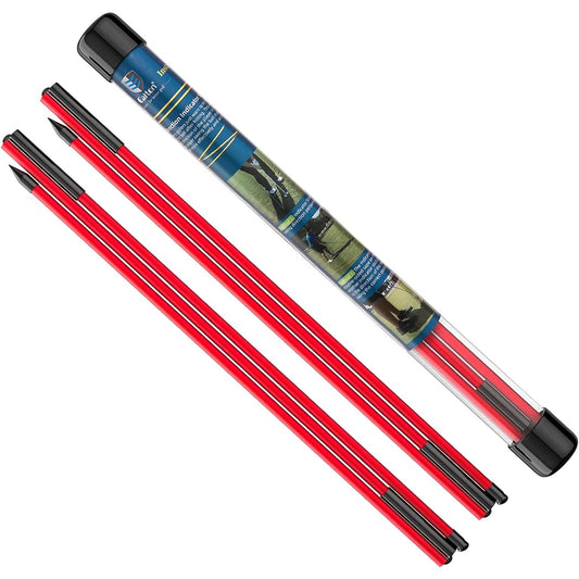 Foldable alignment sticks laid on practice range showing proper target line and body alignment setup